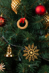Decorations in the Scandinavian style on an artificial Christmas tree