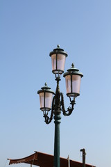 street lamp on blue sky background