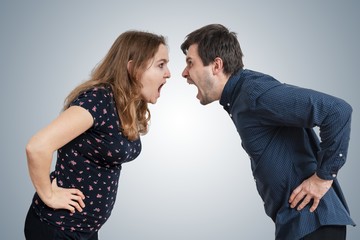 Young couple shouting each other. Divorce concept.