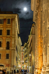 Fototapeta na wymiar Moonrise over Piazza Di Pietra