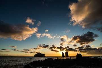 Naklejka na ściany i meble Amazing view of sunset over Mosteiros beach Sao Miguel, Azores Islands