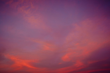 Clouds of beautiful color in the fall. Sunset pink red orange color.