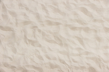 Fototapeta na wymiar Sand Texture. Brown sand. Background from fine sand. Sand background