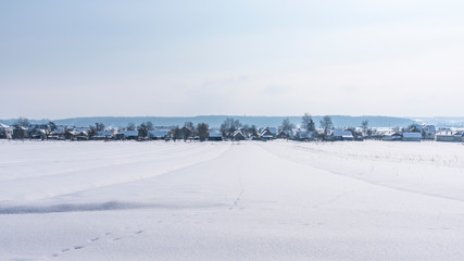Winter landscape, view of village from afar. Western Ukraine
