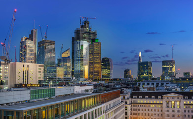 Fototapeta na wymiar Aerial view of skyscrapers of the world famous bank district of central London after dusk