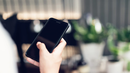 Man using smartphone, During leisure time. The concept of using the phone is essential in everyday life.