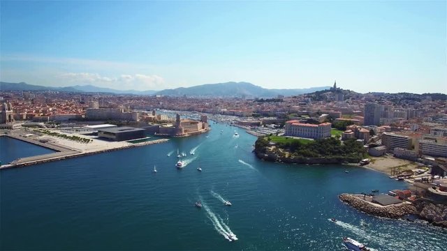 
4K Aerial view of Marseille pier - Vieux Port, Saint Jean castle, and mucem in south of France