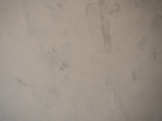 Freshly roughcasted concrete or dry wall with different layers of plaster or Paris, stucco or grout during renovation