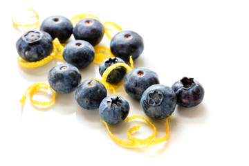 Blueberries and Lemon Zest Isolated on White