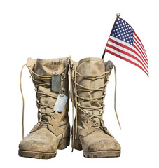 Old military combat boots with the American flag and dog tags, isolated on white background. Memorial Day or Veterans day concept. - 230335340