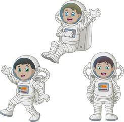 Cartoon happy kids wearing astronaut costumes © idesign2000