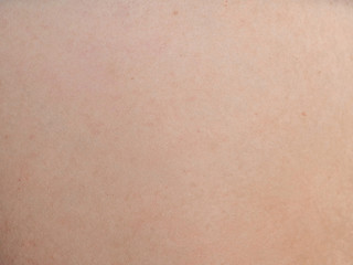 close up on young asian human skin surface texture background.