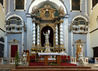 Main altar of the Franciscan Church and Monastery in Dubrovnik, Croatia with the resurrected Christ...