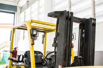 Forklifts in warehouse