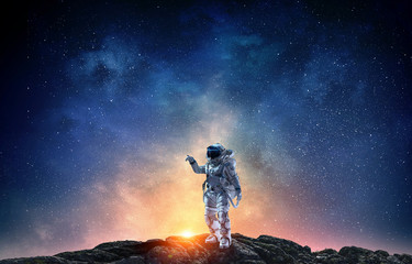 Spaceman and his mission. Mixed media