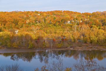 Suburban Washington DC in fall, USA. Neighborhood along Potomac River and Canal Park on a beautiful autumn afternoon.