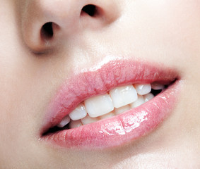 Fototapeta premium Closeup macro portrait of female part of face. Human woman lips with day beauty makeup