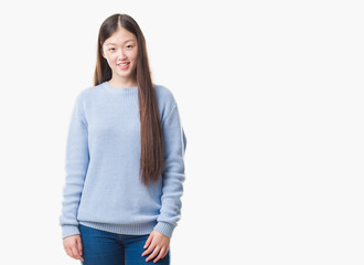 Fototapeta premium Young Chinese woman over isolated background with a happy and cool smile on face. Lucky person.