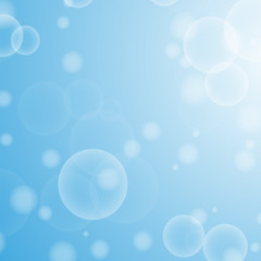 Light blue abstract background with a bokeh in the form of circles. Underwater world with air bubbles. Vector illustration.