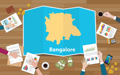 bangalore bangaluru india city region economy growth with team discuss on fold maps view from top