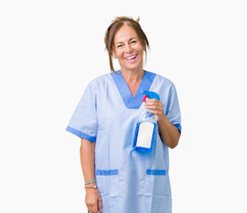 Middle age brunette cleaner woman wearing housework uniform over isolated background with a happy...