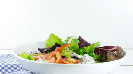 Green salad eat healthy on a white background, with copy space for your text..