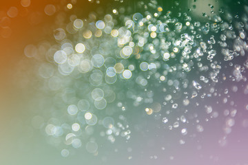 bokeh of water fly and lights on black background,