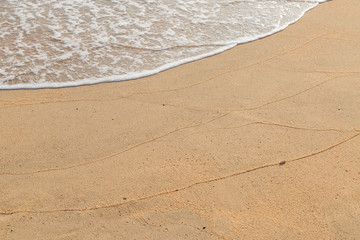 Sand beach and wave