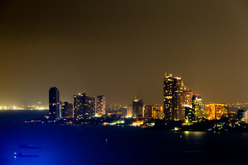 Fototapeta na wymiar skyline at night with urban buildings
