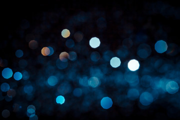 Abstract blue bokeh  texture on black
