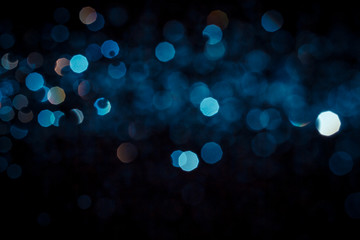 Abstract blue bokeh  texture on black