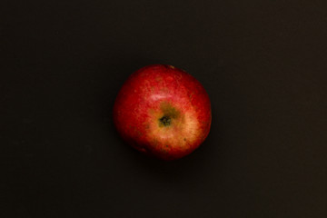 Fototapeta na wymiar Red apple isolated on black background