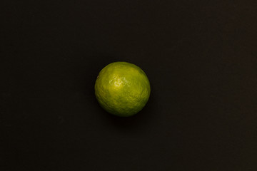 Lemon isolated on black background