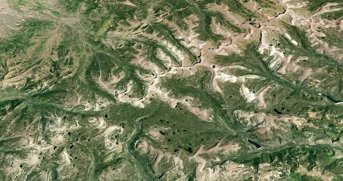 Very high-altitude circular tracking shot of Uinta mountains, Utah. Reversible, seamless loop. Elements of this image furnished by NASA