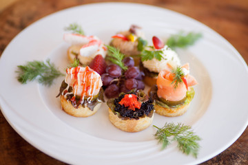 Seafood Tartlets on White Plate