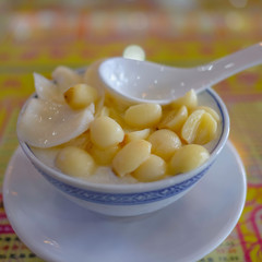 Double skin milk or "shuang pi nai" in chinese name with Ginkgo on top at foshan city china.Double skin milk or "shuang pi nai" the famous desserts in china