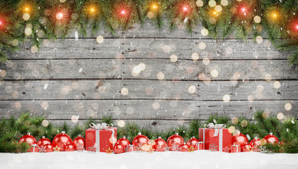 Red christmas baubles and gifts lined up 3D rendering