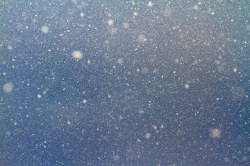winter background sky and falling snow