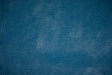 Fototapeta na wymiar Beautiful abstract decorative navy blue grunge stucco wall background