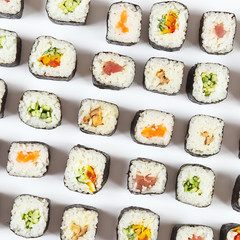 Assorted japanese sushi on a white background. View from above.