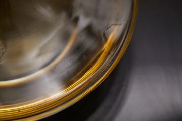 A glass full of wine and wine decanters