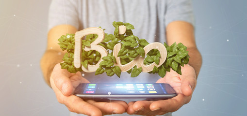 Businessman holding Wooden logo bio with leaves around 3d rendering
