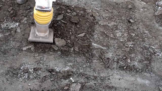 Soil compaction./Special device produces soil compaction for construction work