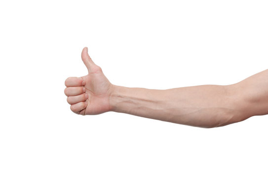 Male hand is showing a thumbs up gesture sign isolated on white background.