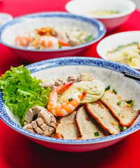 Set of Vietnamese Noodles with Pork and Shrimp Recipe bowl combo on the red carpet 