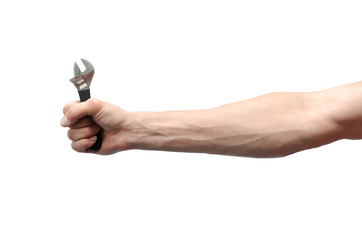 Wrench tool in the male hand isolated on the white background.