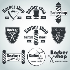 Set of vintage barber shop emblems, label, badges and designed elements. Vector illustration