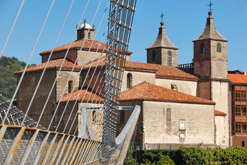Baroque church with modern bridge. Cangas del Narcea, Asturias