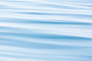 Meditative photo of calming and soothing waves of the sea. Example of relaxing, comforting and happy natural art in contrast with the busy world we people live in.