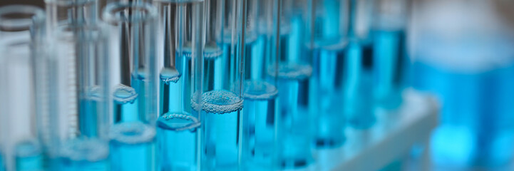 Test tube of glass overflows liquid solution potassium